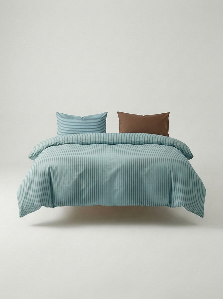 INS Striped Cotton Bedding Set — Sky Blue & Cocoa — made bed
